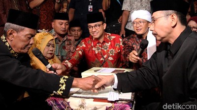 Duet Anies dan Aa Gym Jadi Saksi Nikah Massal Pemprov DKI