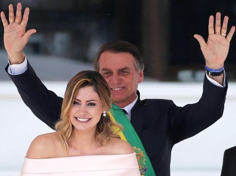Michelle Bolsonaro, Istri Presiden Brazil Brazil's new President Jair Bolsonaro gestures as he drives past before his swearing-in ceremony, in Brasilia, Brazil January 1, 2019. REUTERS/Ricardo Moraes TPX IMAGES OF THE DAY