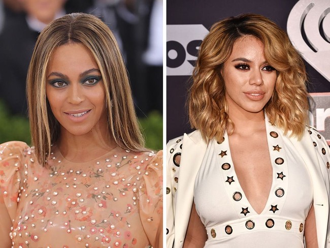 Sama-sama menggeluti dunia musik, Beyonce dan Dinah Jane dari Fifth Harmony berwajah sangat mirip, padahal tidak ada hubungan darah. Kulit cokelat, rambut pirang dan tubuh seksi membuat keduanya jadi mirip satu sama lain. Foto: Getty Images