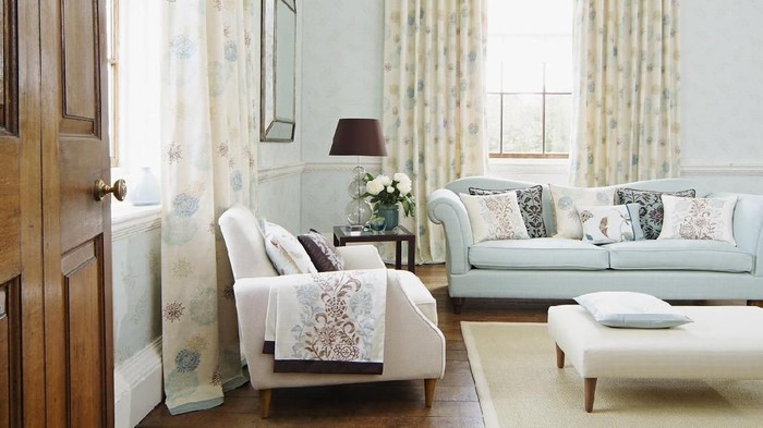 Traditional lounge /living room with sofa, curtains and ornaments Traditional lounge /living room with sofa, curtains and ornaments