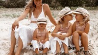 Wanita bernama Eleesha Quinn ini punya ide seru untuk mengabadikan momen bersama anak-anaknya. Tiga anaknya diajak berpose seru saat kulineran. Foto: instagram @the.quinn.girls