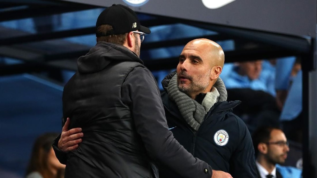 Pep Guardiola anggap tuduhan Juergen Klopp bahwa Manchester City diuntungkan jadwal mengada-ada (Foto: Clive Brunskill/Getty Image)