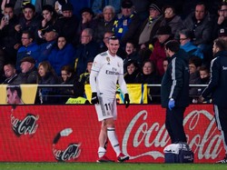 Gareth Bale yang pertama. Dia mengalami masalah pada otot soleus kaki kirinya. Pemain Wales itu diprediksi menepi dua minggu. (Foto: Alex Caparros/Getty Images)