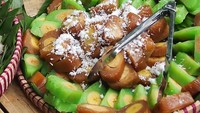 Nyam! Gethuk gulung kacamata yang enak ditaburi dengan kelapa dan diisi dengan pisang. Foto: Instagram@pasarpapringan