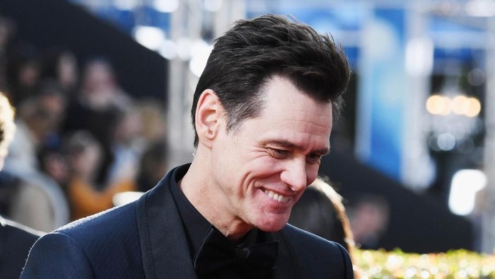 BEVERLY HILLS, CA - JANUARY 06: Jim Carrey (L) and Ginger Gonzaga attend the 76th Annual Golden Globe Awards at The Beverly Hilton Hotel on January 6, 2019 in Beverly Hills, California. (Photo by Frazer Harrison/Getty Images)