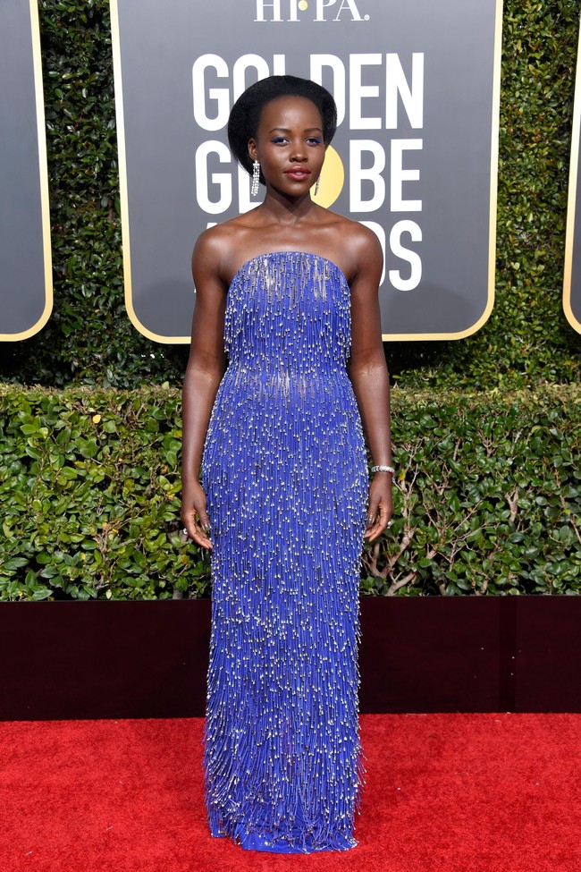 Lupita Nyongo dikenal dengan perannya dalam film Us dan Black Panther: Wakanda Forever. Aktris berdarah Kenya itu belum lama mengenalkan kekasihnya Selema Masekela kepada publik. Foto: Frazer Harrison/Getty Images