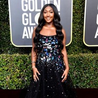 Isan adalah putri dari hasil hubungan Idris dengan makeup artist Kim Norgaard. Mereka menikah pada 1999 tapi bercerai empat tahun kemudian. Foto: Frazer Harrison/Getty Images