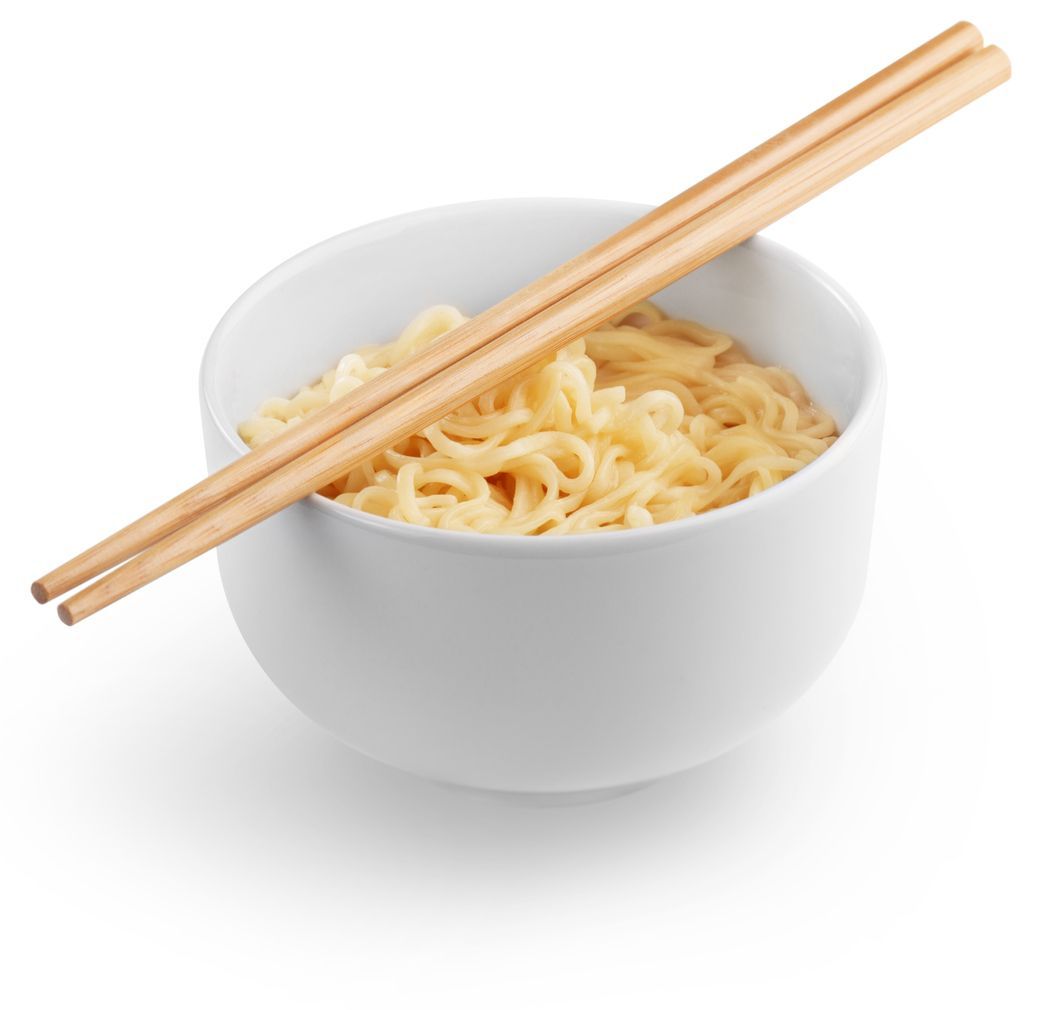 Instant noodle and spicy seasoning in white bowl with chopstick