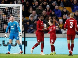Divock Origi menyamakan skor pada menit ke-51 lewat sepakan terukur dari luar kotak penalti. Ini adalah gol kedua Origi musim ini.(Carl Recine/Reuters)