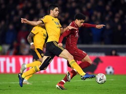 Termasuk juga debutan berusia 16 tahun Ki-Jana Hoever yang dimainkan di awal laga sebagai pengganti. Ini adalah debut profesional Ki-Jana. (Michael Regan/Getty Images)