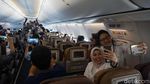 Foto: Garuda Indonesia Bikin Konser Musik di Udara