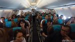 Foto: Garuda Indonesia Bikin Konser Musik di Udara