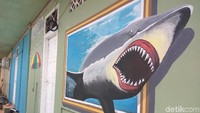 Rumah-rumah dicat warna-warni serta dibikin mural. Letaknya ada di Bantaran Krueng Dho, Lorong Kerinci, Desa Seutui, Kecamatan Baiturrahman, Banda Aceh, Aceh (Agus Setyadi/detikTravel)