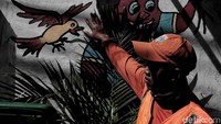 Seorang petugas kebersihan melihat satu mural bergambar burung.