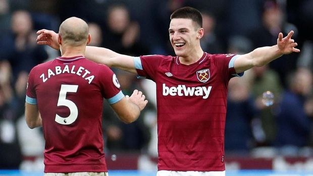 Declan Rise (kanan) mencetak gol kemenangan West Ham ke gawang Arsenal.