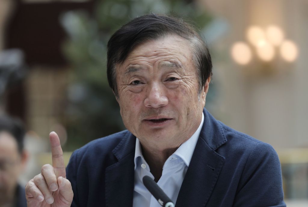 Ren Zhengfei, founder and CEO of Huawei, gestures during a round table meeting with the media in Shenzhen city, south China's Guangdong province, Tuesday, Jan. 15, 2019. The founder of network gear and smart phone supplier Huawei Technologies said the tech giant would reject requests from the Chinese government to disclose confidential information about its customers. (AP Photo/Vincent Yu)