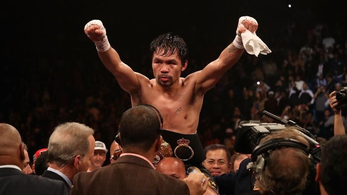 LAS VEGAS, NEVADA - JANUARY 19:  Manny Pacquiao celebrates after defeating Adrien Broner by unanimous decision during the WBA welterweight championship at MGM Grand Garden Arena on January 19, 2019 in Las Vegas, Nevada. (Photo by Christian Petersen/Getty Images)