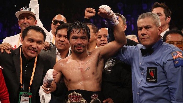 LAS VEGAS, NEVADA - JANUARY 19:  Manny Pacquiao celebrates after defeating Adrien Broner by unanimous decision during the WBA welterweight championship at MGM Grand Garden Arena on January 19, 2019 in Las Vegas, Nevada. (Photo by Christian Petersen/Getty Images)