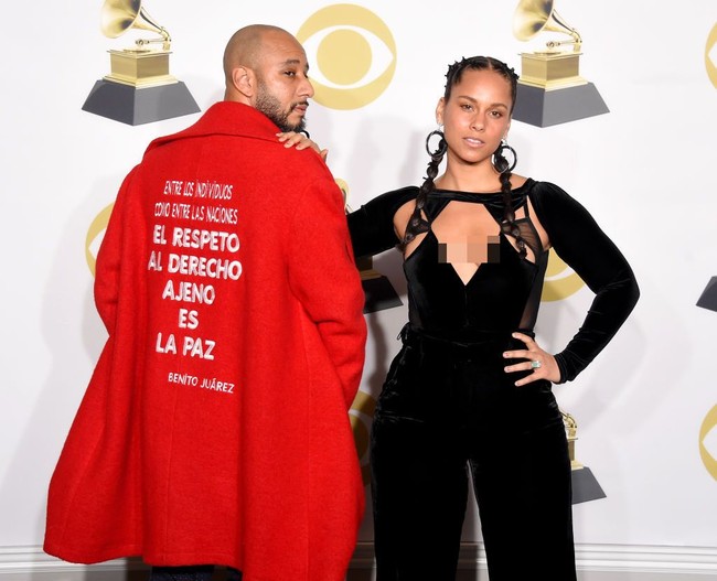 Rapper Swizz Beatz masih jadi suami Mashonda ketika dia selingkuh dengan Alicia Keys pada 2008. Keduanya lalu menikah pada 2010 dan dikaruniai dua anak. Cap pelakor melekat pada Alicia Keys dan ia juga pernah dihujat publik. Foto: Michael Loccisano/Getty Images