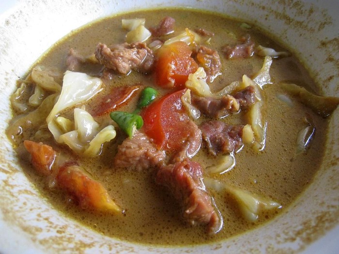 Tongseng, a Javanese spicy and rather sweet goat meat soup. Specialty of Solo (Surakarta), Central Java.