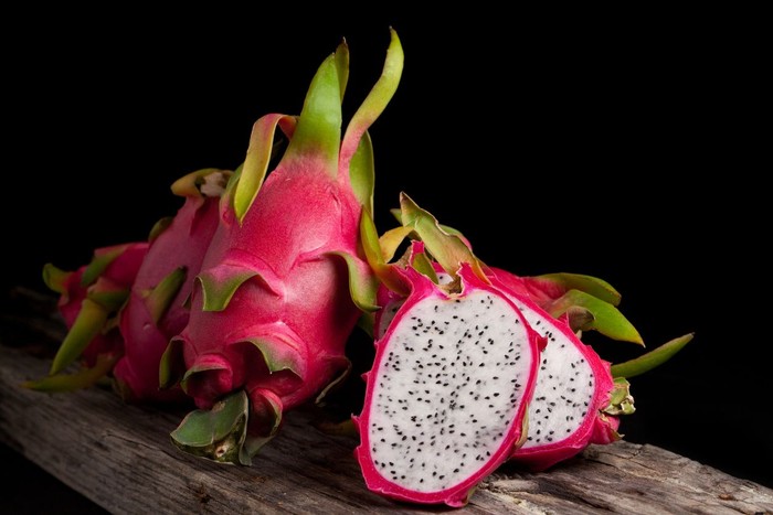 Dragon fruit smoothie on wooden table.food healthy