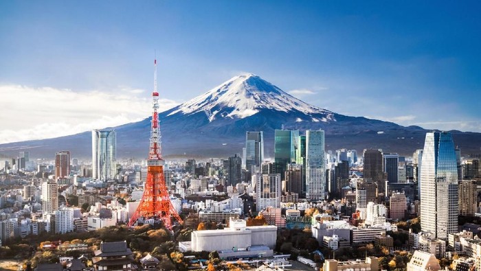 View of Mt. Fuji and Tokyo skyline at dusk.