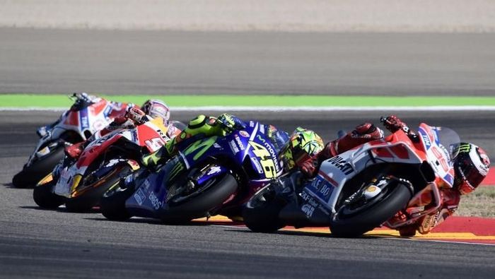 Jorge Lorenzo berduet dengan Marc Marquez yang sedang di puncak karier. Foto: Javier Soriano/ AFP Photo Jorge Lorenzo berduet dengan Marc Marquez yang sedang di puncak karier. Foto: Javier Soriano/ AFP Photo