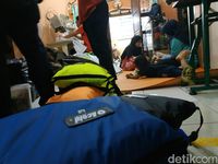 Produksi Jas Hujan