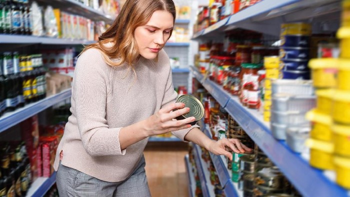 Various nutrition labels for a variety of packaged food products. Labels show calories, fat content, cholesterol, carbohydrates, protein, sodium, sugars, daily recommended litmits, vitamins and specfic ingredients in the foods. Prominent top label shows a whopping 680 mg soldium in the food product.