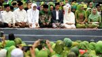 Berkopiah dan Sarung, Potret Jokowi di Harlah ke-73 Muslimat NU