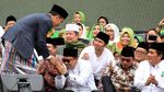 Berkopiah dan Sarung, Potret Jokowi di Harlah ke-73 Muslimat NU