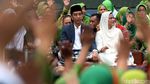 Berkopiah dan Sarung, Potret Jokowi di Harlah ke-73 Muslimat NU