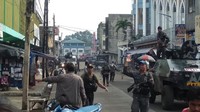 Tentara dikerahkan menjaga gereja setelah terjadi serangan bom. Western Mindanao Command/Handout via REUTERS.