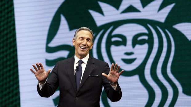 FILE - In this March 22, 2017 file photo, Starbucks CEO Howard Schultz speaks at the Starbucks annual shareholders meeting in Seattle.  For someone who has given about $150,000 to Democratic campaigns over the year, Schultz is generating tepid, or even hostile, responses within the party as he weighs a presidential bid in 2020. That's because reports have suggested he's considering running as an independent, a prospect that could draw support away from the eventual Democratic nominee and hand President Donald Trump another four years in office, many frets.  (AP Photo/Elaine Thompson, File)