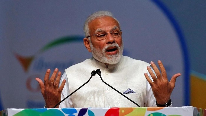 FILE PHOTO: Indias Prime Minister Narendra Modi speaks during the Vibrant Gujarat Global Summit in Gandhinagar, India, January 18, 2019. REUTERS/Amit Dave/File Photo