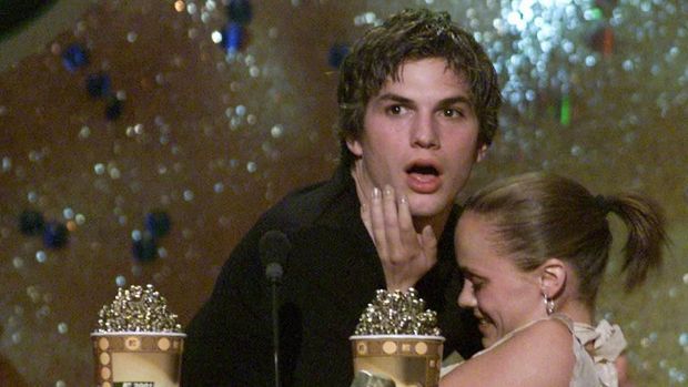 Ashton Kutcher Christina Ricci and Ashton Kutcher react after kissing at the 2001 MTV Movie Awards at the Shrine Auditorium in Los Angeles Saturday, June 2, 2001.(Photo by Kevin Winter/Getty Images)