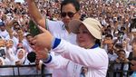Potret Kampanye Akhir Pekan: Prabowo Jalan Sehat, Jokowi Sambut Dukungan