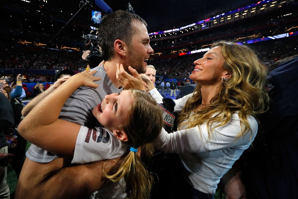 ATLANTA, GA - FEBRUARY 03:  Tom Brady #12 of the New England Patriots celebrates with his wife Gisele BÃ¼ndchen after the Super Bowl LIII against the Los Angeles Rams at Mercedes-Benz Stadium on February 3, 2019 in Atlanta, Georgia. The New England Patriots defeat the Los Angeles Rams 13-3.  (Photo by Kevin C. Cox/Getty Images)