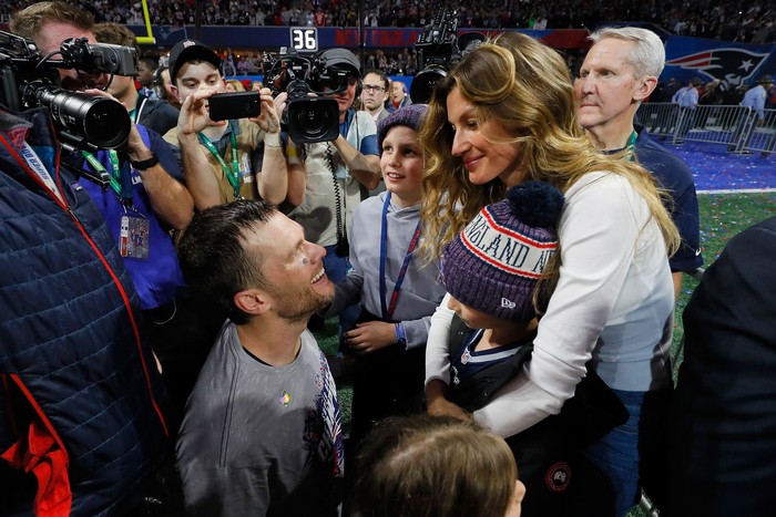 ATLANTA, GA - FEBRUARY 03:  Tom Brady #12 of the New England Patriots celebrates with his wife Gisele BÃ¼ndchen after the Super Bowl LIII against the Los Angeles Rams at Mercedes-Benz Stadium on February 3, 2019 in Atlanta, Georgia. The New England Patriots defeat the Los Angeles Rams 13-3.  (Photo by Kevin C. Cox/Getty Images)