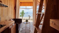 Kayu diharapkan mampu menjaga bangun tahan lama menghadapi iklim laut. Istimewa/Inhabitat/Atelier Riri.