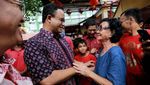 Potret Anies Saat Imlek: Lepas Burung hingga Beli Baju Cheongsam