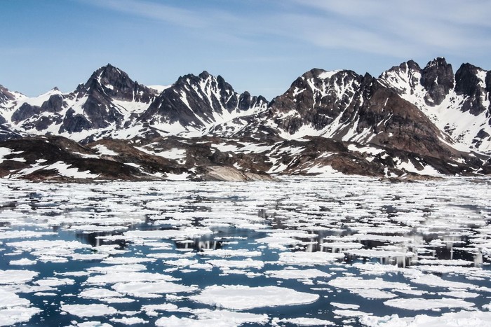 Sea ice breaking up in spring. Near Kulusuk, Greenland.