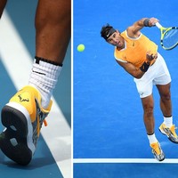 Pemain tenis nomor dua dunia, Rafael Nadal, juga tampil dengan sepatu khusus dari Nike. Bagian belakang dari sepatu berwarna kuning tersebut berukirkan tulisan RAFA, panggilan Rafael. (Foto: Getty Images)
