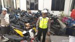 Scoopy Dicabik-cabik Pengendara yang Kena Tilang