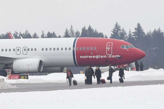 A Norwegian Air Shuttle plane is seen on the tarmac of the Arlanda airport, outside Stockholm, Sweden February 7, 2019. TT News Agency/Jonas Ekstromer via REUTERS   ATTENTION EDITORS - THIS IMAGE WAS PROVIDED BY A THIRD PARTY. SWEDEN OUT. NO COMMERCIAL OR EDITORIAL SALES IN SWEDEN.