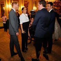 Pangeran Harry dan Meghan saat berinteraksi dengan para tamu di acara tersebut. (Foto: Getty Images)