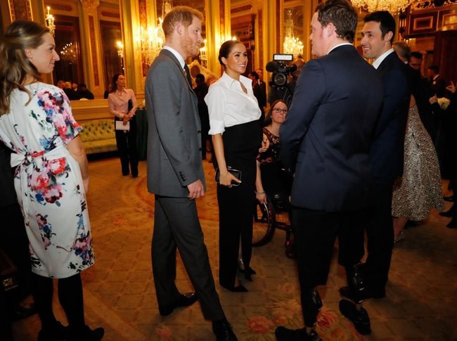 Pangeran Harry dan Meghan saat berinteraksi dengan para tamu di acara tersebut. (Foto: Getty Images)