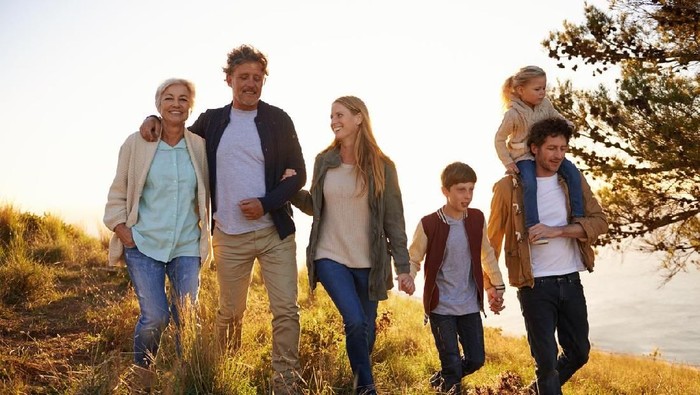 Shot of a happy family out on a morning walk together