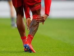 Tato sudah jadi bagian dari para pesepkbola modern saat ini. Tahukah Anda ini tato milik siapa? (Phil Noble/Reuters)