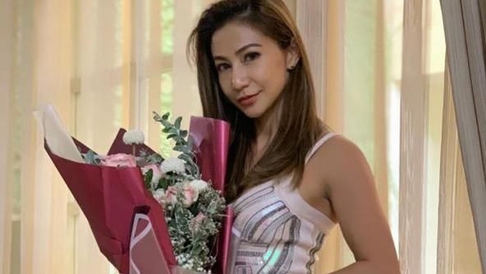 Otot kekar tapi masih feminin? Foto: Dok. Pribadi Jeanny Gosali Otot kekar tapi masih feminin? Foto: Dok. Pribadi Jeanny Gosali